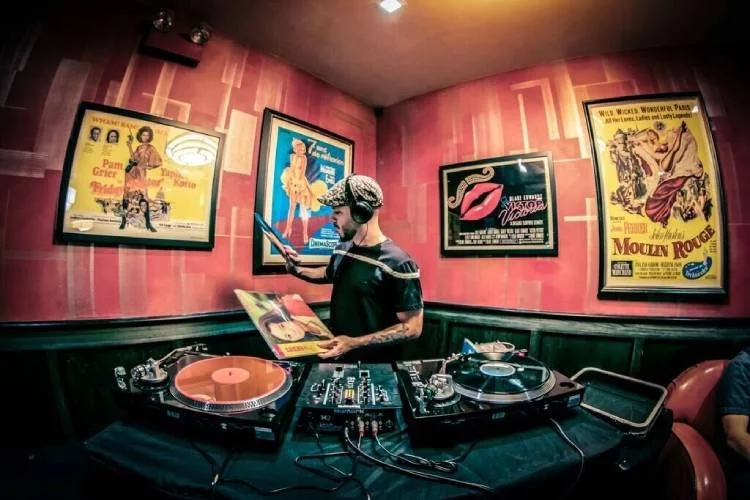 Van Paugam DJing a set from vinyl